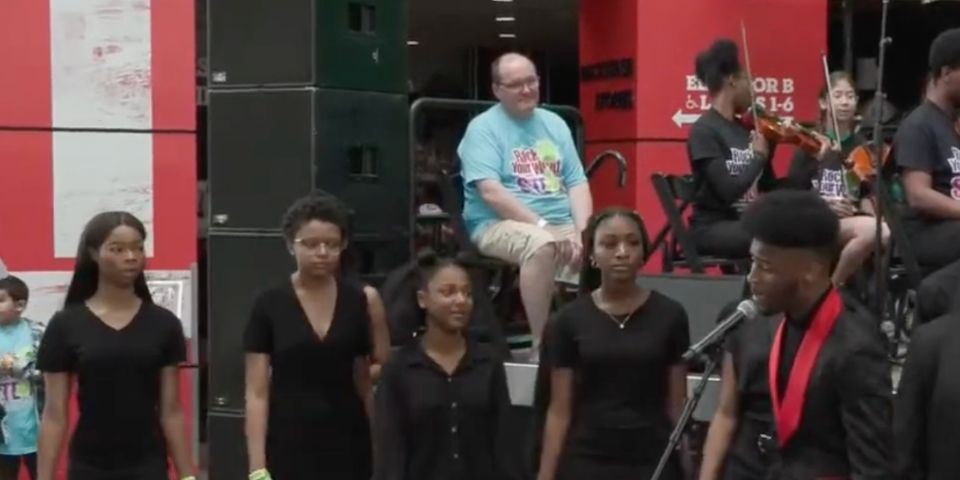  Students serenade CEO Gordon at Rock Your World with STEAM (Video)